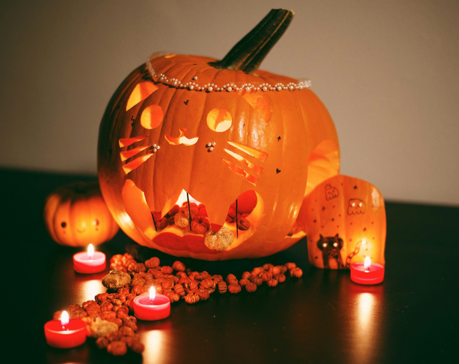 jack o lantern with red and white beads